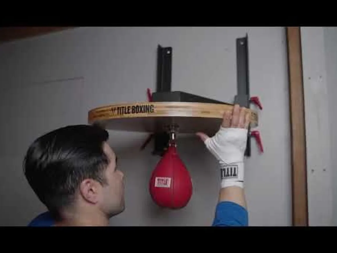 TITLE Boxing Forged Steel Adjustable Pro Speed Bag Platform
