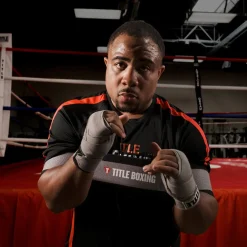 TITLE Elbows-In Boxing Trainer